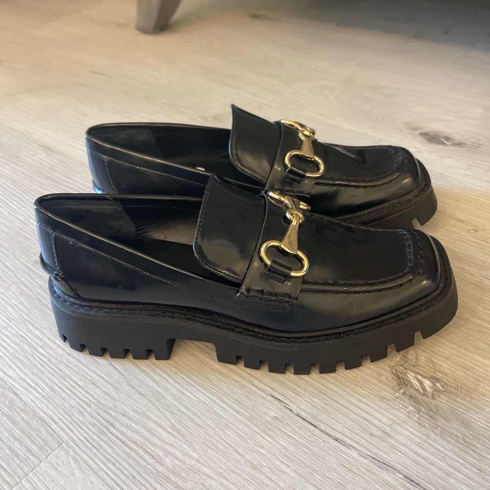 Glossy Black Loafers with Gold Accent